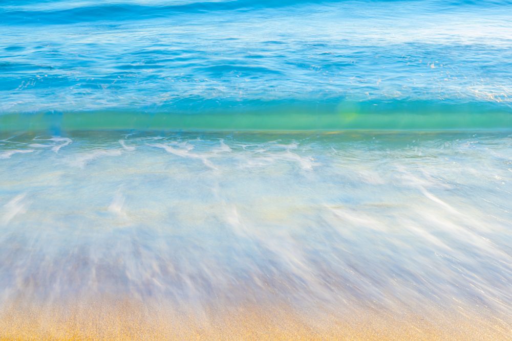 Serene Shores: A Dance of Waves and Light